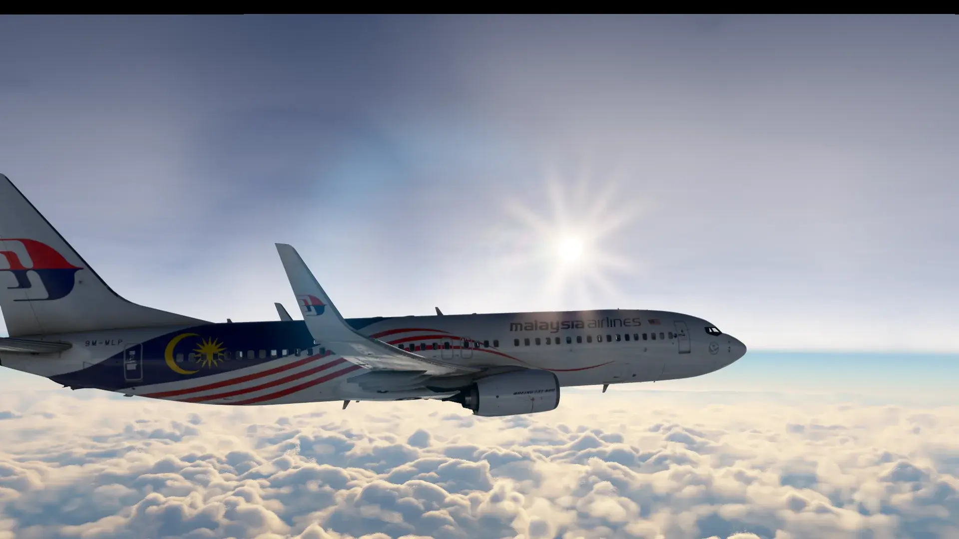 Malaysia Airlines Boeing 737-800 (9M-MLP) in Negaraku livery cruising above the clouds.